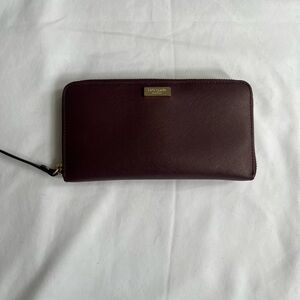 Kate Spade Burgundy Saffiano Leather Zip Around Wallet